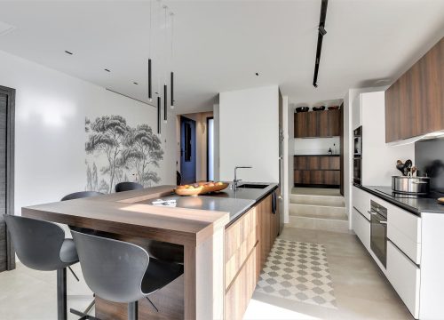 Réalisation d'une cuisine aménagée avec ilot central équipements intégrés modernes montage et assemblage par agencements mg mauguio prés de Montpellier